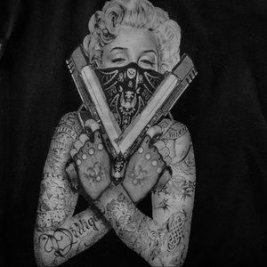 Dainty Marilyn Monroe packing the heat...tank top